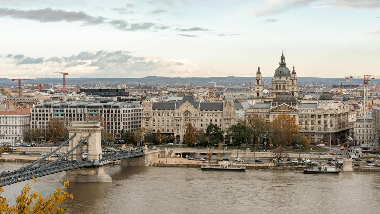 Exploring Budapest must experiance a scenic riverside path connecting the Elizabeth and Chain Bridges.