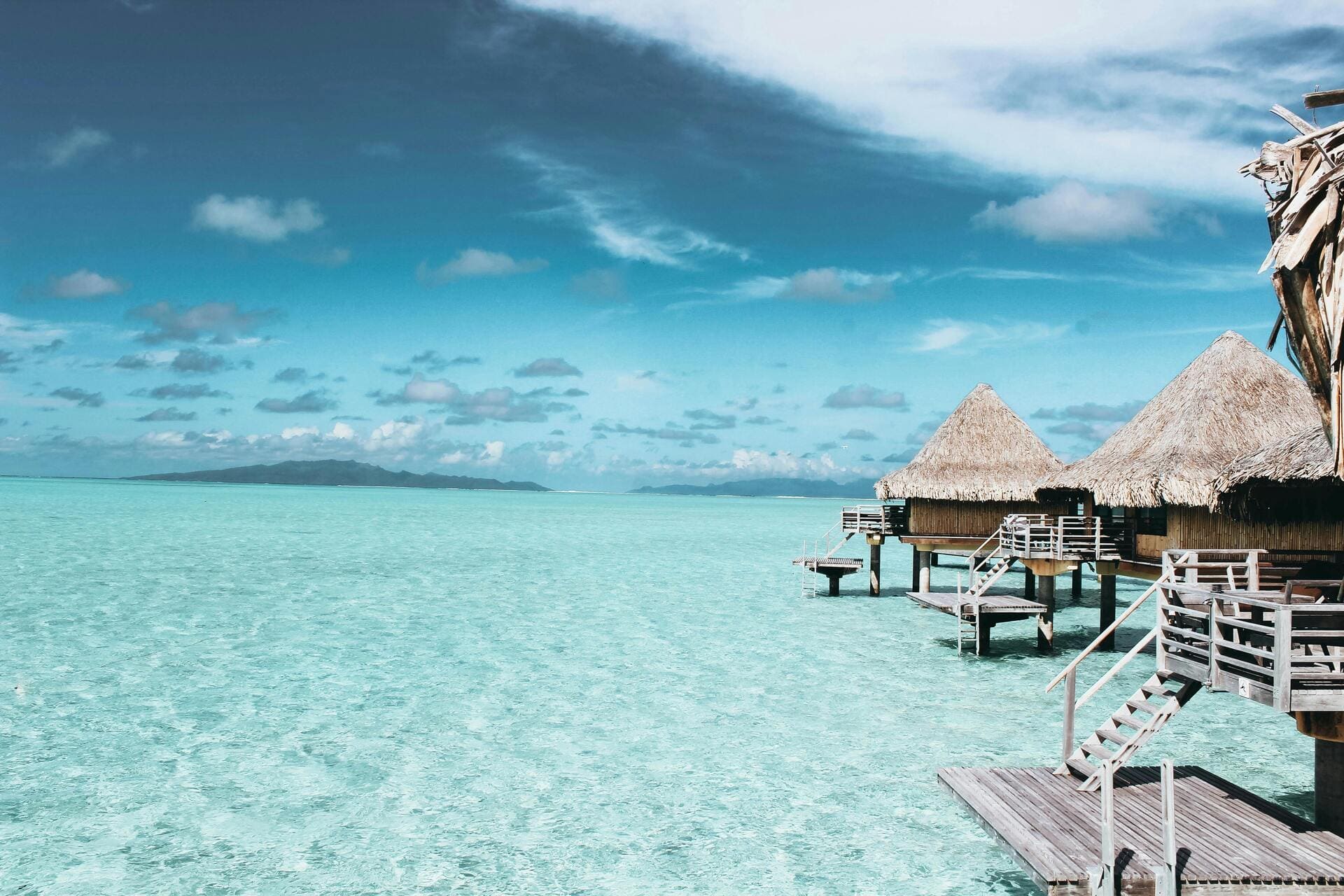 overwater bungalows in the pacific island