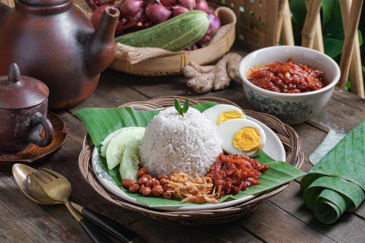 A popular food from s-e asia is Malaysian classic — Nasi Lemak A fragrant, spicy, and satisfying feast on a single plate.