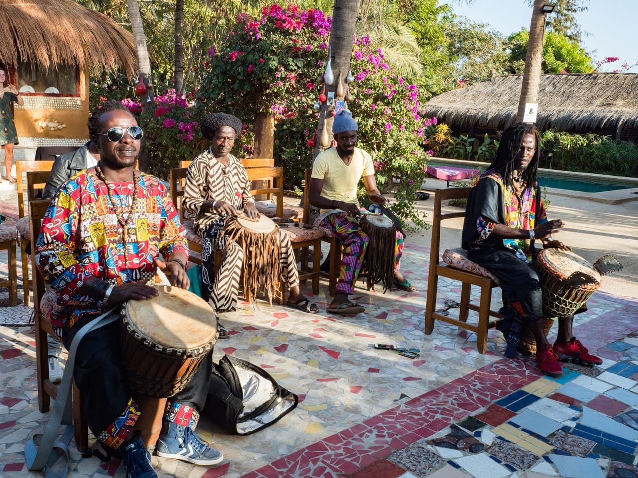 Vibrant rhythms of West Africa — local musicians bringing traditional beats to life.