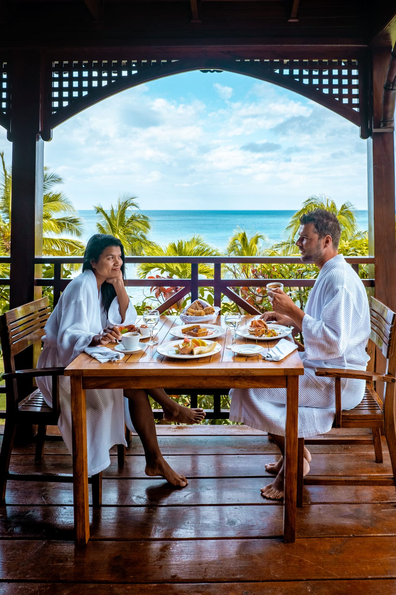 Couple relishing food in St lucia